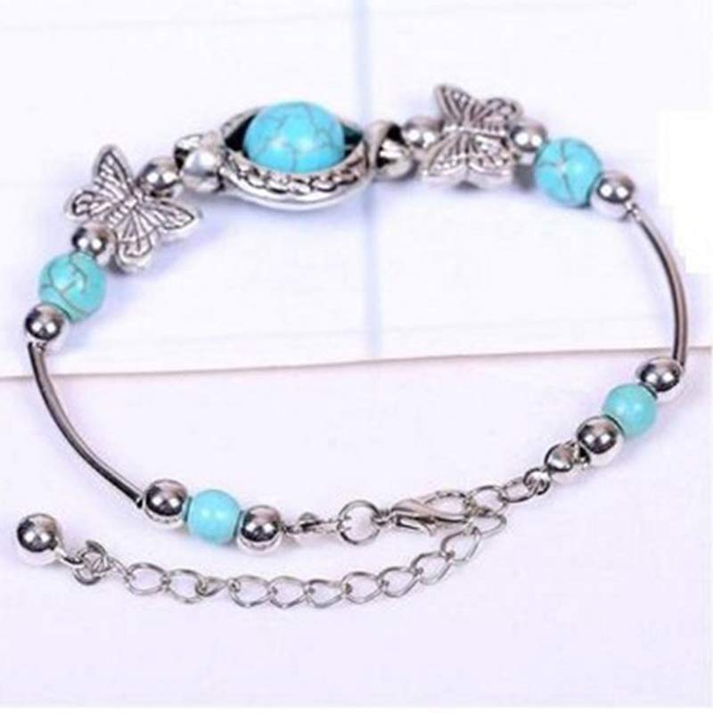 Bracelet papillon en sphère turquoise Olivenorma