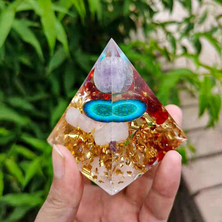 Sphère d'améthyste Olivenorma avec pyramide d'orgone en cristal rose 