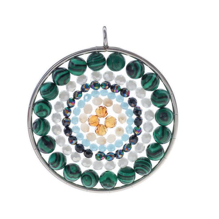 Collier avec pendentif rond en cristal et fleur de datura Olivenorma
