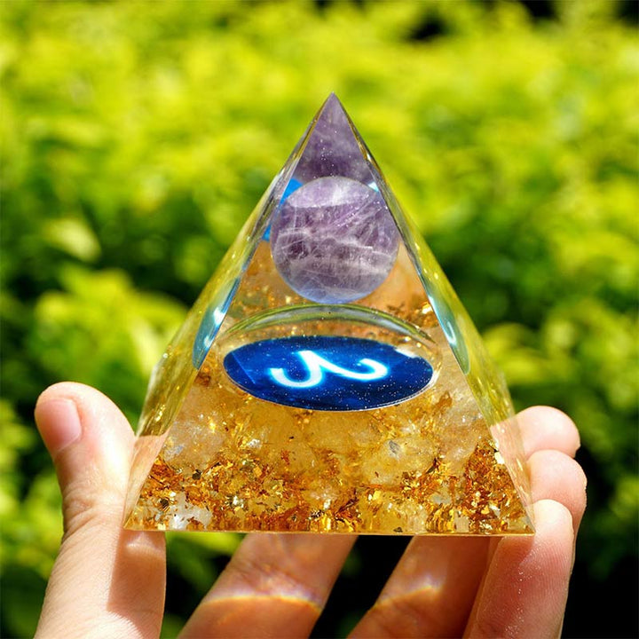 Pyramide d'orgone du zodiaque Bélier en améthyste Olivenorma avec rutile doré