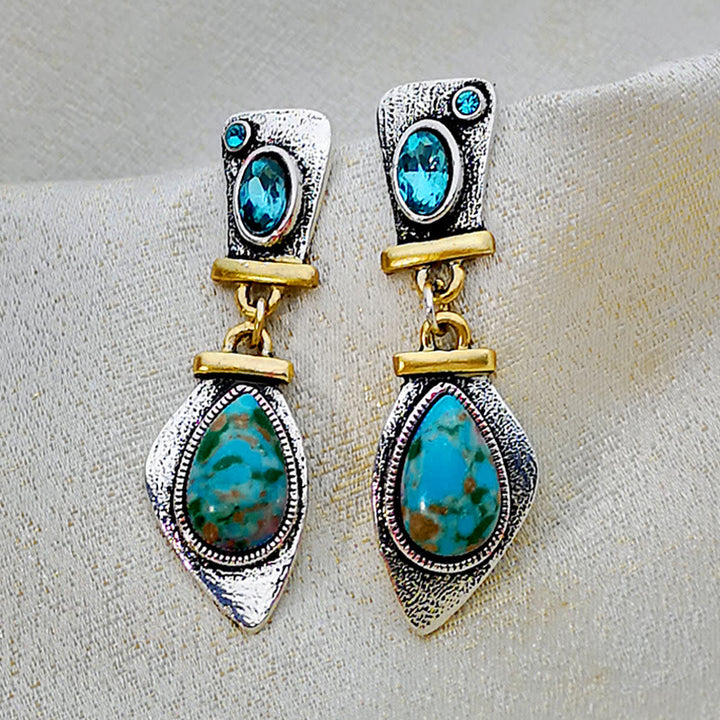 Boucles d'oreilles en argent avec topaze bleue et pierre empereur Olivenorma 