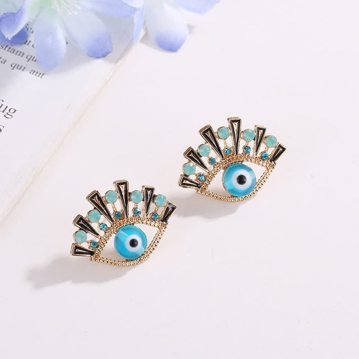 Olivenorma « Eye of Doom » - Boucles d'oreilles paon créatives en saphir