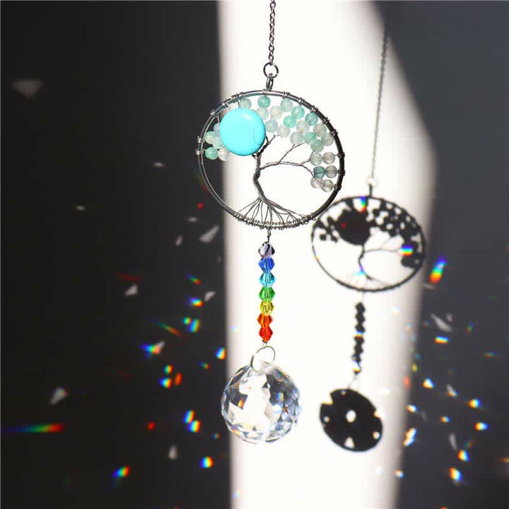 Attrape-soleil en cristal coloré représentant un arbre de vie