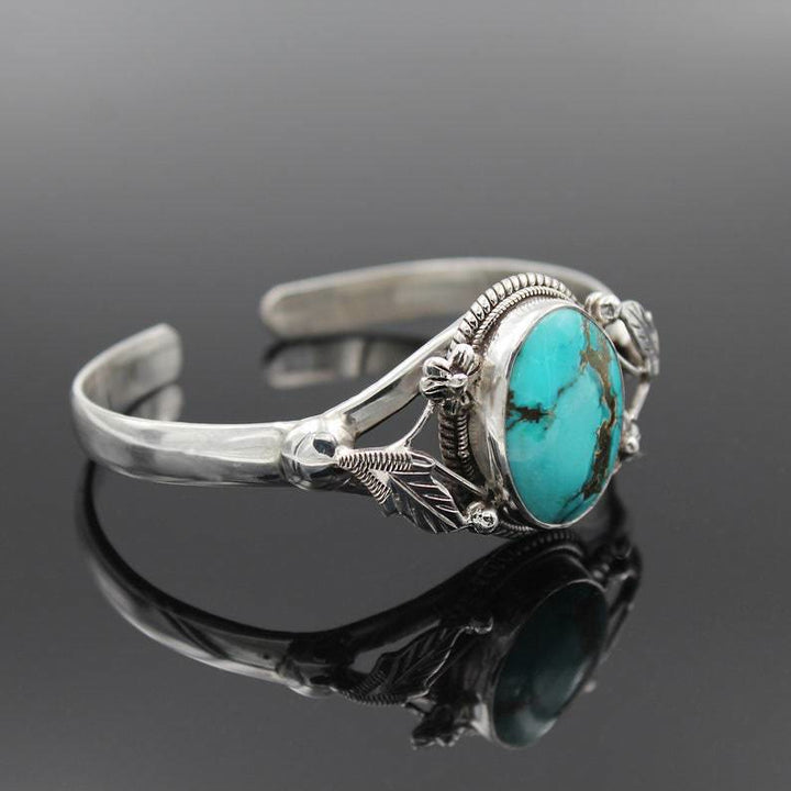 Bracelet turquoise à fleurs gravées vintage Olivenorma