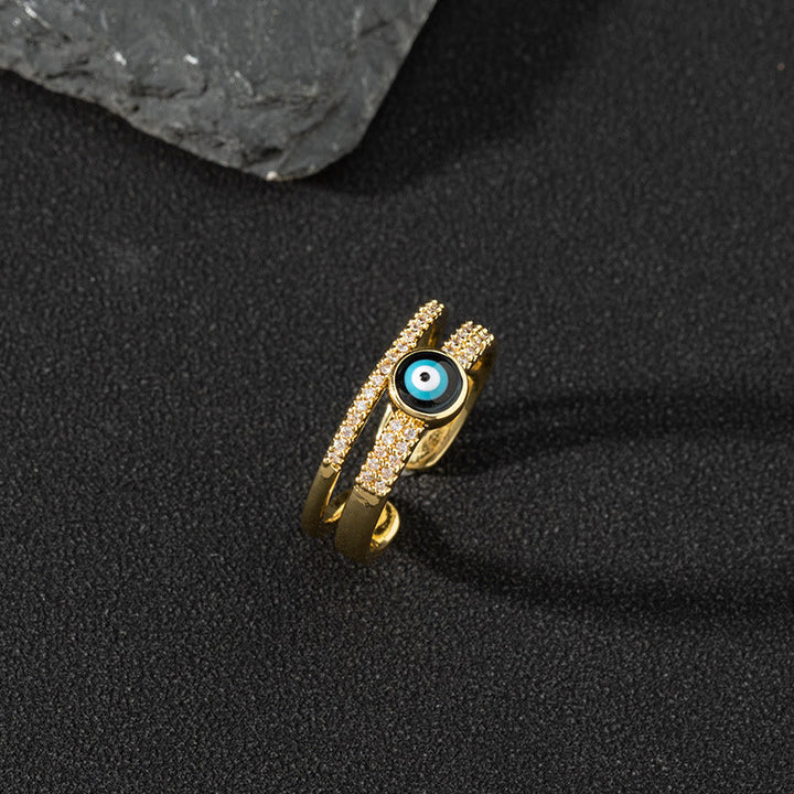 Bague ajustable Olivenorma en zircon blanc avec mauvais œil