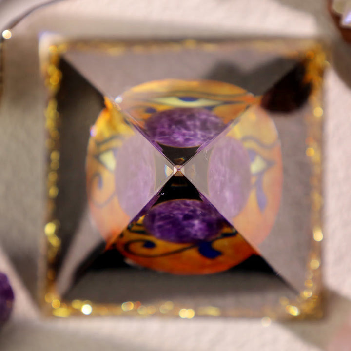 Pyramide d'orgone Oeil d'Horus en obsidienne améthyste Olivenorma