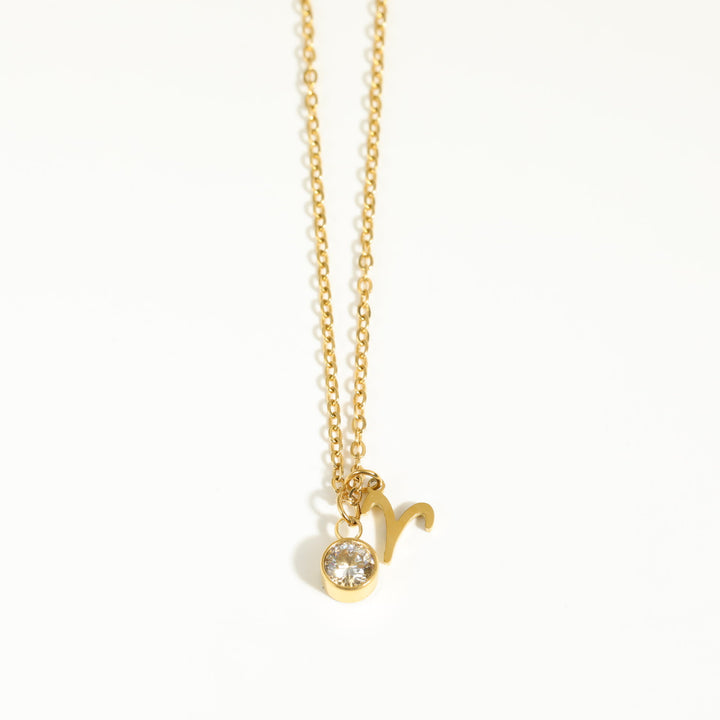 Collier en acier inoxydable avec pierre de naissance et runes du zodiaque Olivenorma